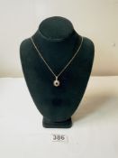 A 9ct GOLD PENDANT SET WITH DIAMOND, RUBY, EMERALD, AND SAPPHIRE ON CHAIN, 5.2 GRAMS.