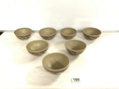 SEVEN MATCHING STUDIO POTTERY BOWLS BY RACHEL SWIFT. BEARING THE SWIFT STAMP TO BASE.