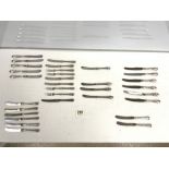 SETS OF SILVER HANDLED TEA KNIVES AND CAKE FORKS.