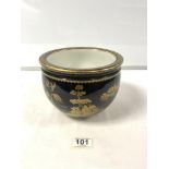 A BLACK AND GOLD LACQUER DECORATED PORCELAIN JARDINERE, 15 X 20.