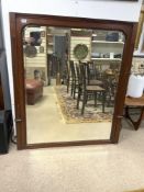 EARLY 20TH CENTURY LARGE BEVELLED MIRROR IN A MAHOGANY WOODEN FRAME, 140 X 119 CM
