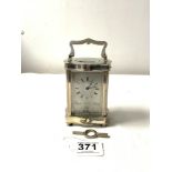 ROYAL SILVER JUBILEE 1977 - SILVER PLATED SERPENTINE CARRIAGE CLOCK WITH ENGRAVED SILVERED DIAL;