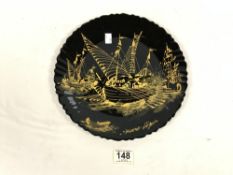 A FRENCH ARCOPAL BLACK AND GOLD DECORATED SOUVENIR PLATE. 30 CMS.