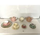 A ROYAL STAFFORDSHIRE CERAMIC BY CLARICE CLIFF ROSE DECORATED TRIO, PINK WEDGEWOOD PORCELAIN TEA