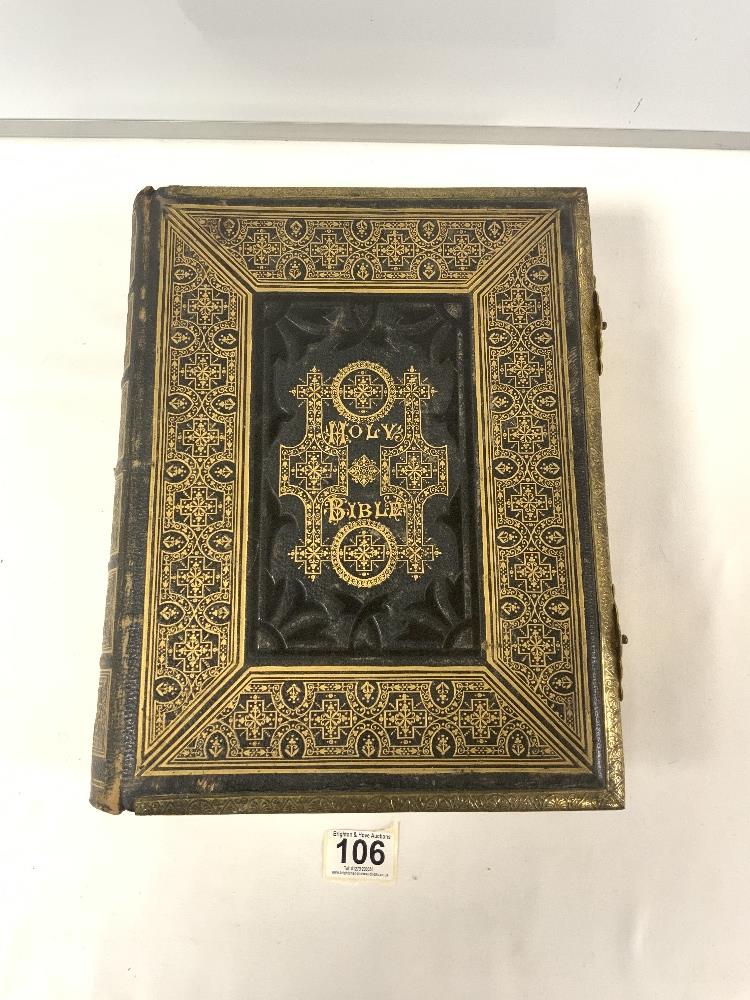 A VICTORIAN LEATHER BOUND FAMILY BIBLE WITH ORNATE BRASS CLASPS.