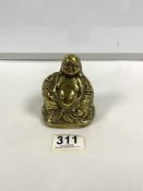 A POLISHED BRONZE FIGURE OF A BUDDHA; 9 CMS