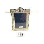 A HALLMARKED SILVER RECTANGULAR PHOTO FRAME - CARRS OF SHEFFIELD, 9 X 6.5 CMS APERTURE.