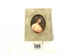 OVAL GILT FRAMED MINATURE ON PORCELAIN PORTRAIT OF A YOUNG WOMAN; SIGNED WAGNER, 8 X 6.5