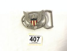 A VINTAGE AMERICAN EAGLE BELT BUCKLE WITH ENAMEL STARS AND STRIPES