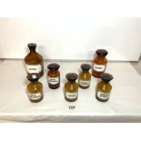 SEVEN BROWN GLASS CHEMISTS JARS - CETIOL, ALUMEN, BORAX ETC.