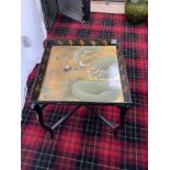 A CHINESE BLACK AND GOLD LACQUERED DUCK DECORATED DRINKS TRAY ON FOLDING STAND, 54 X 60.