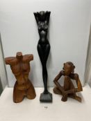 TWO CARVED WOODEN FIGURES WITH A LARGE WOODEN CARVED TORSO LARGEST 83 CM
