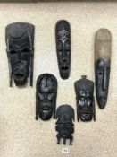 SIX AFRICAN CARVED WOODEN WALL MASKS.