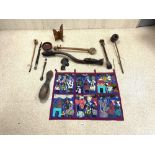 A LARGE WOODEN TRIBAL PIPE, SMALLER PIPE, AN INSTRUMENT, AND OTHER TRIBAL ITEMS.