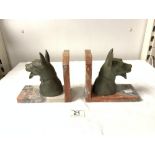 A PAIR OF FRENCH ART DECO SPELTER AND MARBLE ALSATIAN DOGS HEAD BOOKENDS.