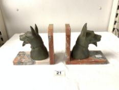 A PAIR OF FRENCH ART DECO SPELTER AND MARBLE ALSATIAN DOGS HEAD BOOKENDS.