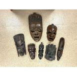 QUANTITY OF AFRICAN TRIBAL WALL MASKS LARGEST 58CM