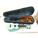 A MAHALO UKULELE, AND A MODERN VIOLIN AND BOW IN CASE.