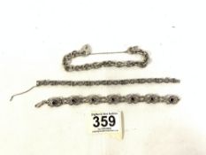 A HALLMARKED SILVER CHAIN LINK BRACELET AND TWO 925 SILVER BRACELETS; ONE SET WITH BLACK ONYX