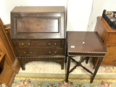 A CHIPPENDALE STYLE MAHOGANY BUREAU AND SQUARE OCCASIONAL TABLE, BOTH WITH FRETWORK DECORATION.