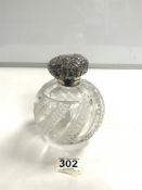 A LARGE CUT GLASS SCENT BOTTLE WITH SILVER TOP A/F AND INNER STOPPER.
