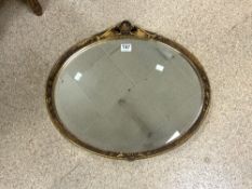 VINTAGE BEVELLED EDGED OVAL MIRROR IN DECORATIVE GILDED FRAME 57 X 50CM