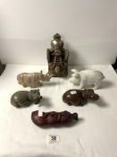 TWO SOAPSTONE HIPPOS AND A RHINOCEROS, A MARBLE PIG, AND AN INDIAN CARVED WOODEN WALL MOUNT.