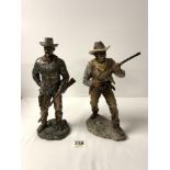 TWO COWBOY STATUES; BOTH IN RESIN. ONE OF JOHN WAYNE AND ONE 'YOUNG GUN' (THE LEONARDO