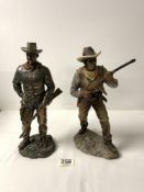 TWO COWBOY STATUES; BOTH IN RESIN. ONE OF JOHN WAYNE AND ONE 'YOUNG GUN' (THE LEONARDO
