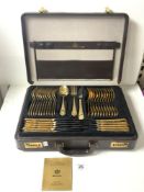 A CANTEEN CASE OF GOLD PLATED AND NICKEL STEEL CUTLERY, MADE IN GERMANY BY BESTECKE.