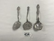 THREE AMERICAN STERLING SILVER DECORATIVE SPOONS 73 GRAMS