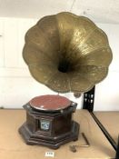 A REPRODUCTION HMV WIND UP GRAMAPHONE WITH BRASS HORN.