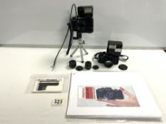 TWO PENTAX AUTO 110 CAMERAS AND FLASHES, ONE WITH STAND, PLUS TWO ADDITIONAL LENSES.