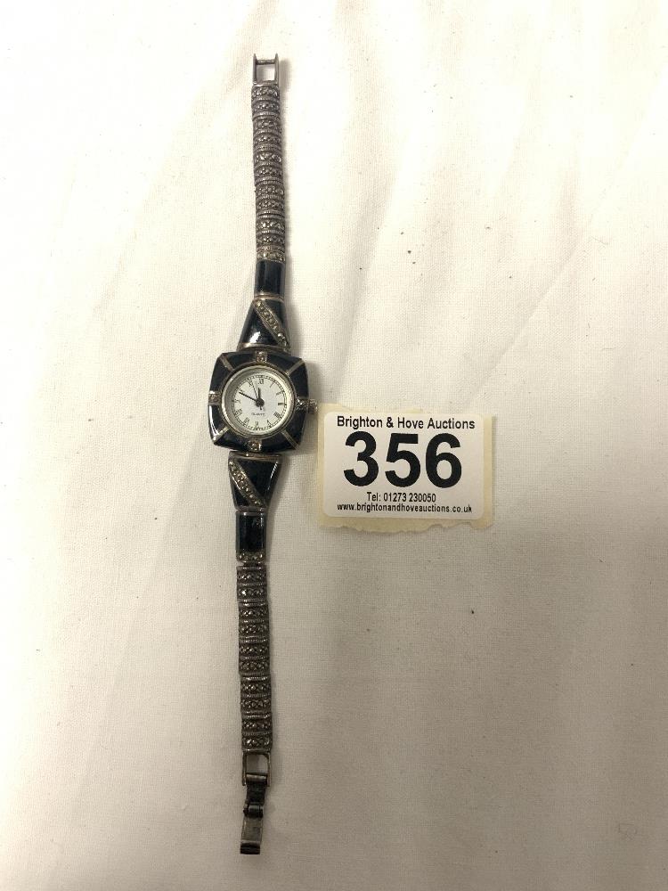 A 925 SILVER, BLACK ENAMEL AND MARCASITE LADIES WRISTWATCH, WITH A QUARTZ MOVEMENT.