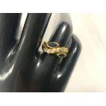 VINTAGE 750 GOLD RING DECORATED WITH SEVEN DIAMONDS AND TWO SAPPHIRES SIZE N