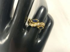VINTAGE 750 GOLD RING DECORATED WITH SEVEN DIAMONDS AND TWO SAPPHIRES SIZE N
