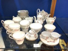 PAAGON BRIDAL ROSE PATTERN 31 PIECE TEA SET, AND A LEAF PATTERN TEA POT STAND AND SMALL TEA POT.