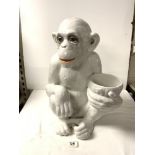 A WHITE CERAMIC FIGURE OF A CHIMPANZEE, MADE IN ITALY, 50 CMS.