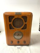 A BUSH 1930s STYLE WOODEN RADIO.