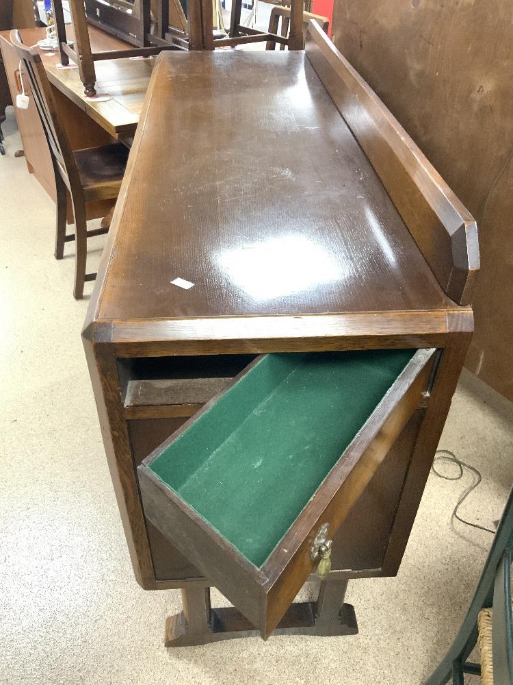 A 1940s OAK DINING SUITE WITH CARVED HEAD MOTIFS DECORATION - INCLUDES A DRAW LEAF TABLE, FOUR - Image 12 of 12