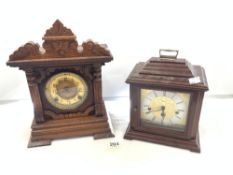 A LATE 19 CENTURY AMERICAN CARVED OAK MANTEL CLOCK WITH 8 DAY STRIKING MOVEMENT - BY ANSONIA CLOCK