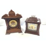 A LATE 19 CENTURY AMERICAN CARVED OAK MANTEL CLOCK WITH 8 DAY STRIKING MOVEMENT - BY ANSONIA CLOCK