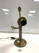 A VINTAGE BRASS WESTERN ELECTRIC STICK TELEPHONE CONVERTED TO TABLE LAMP.