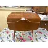 RETRO CANTILEVER SEWING BOX ON SPLAYED LEGS SOME CONTENTS