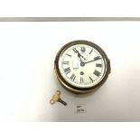 A BRASS SHIPS CLOCK, WITH PAINTED DIAL, AND SUBSIDERY DIAL, 17CMS DIAMETER.