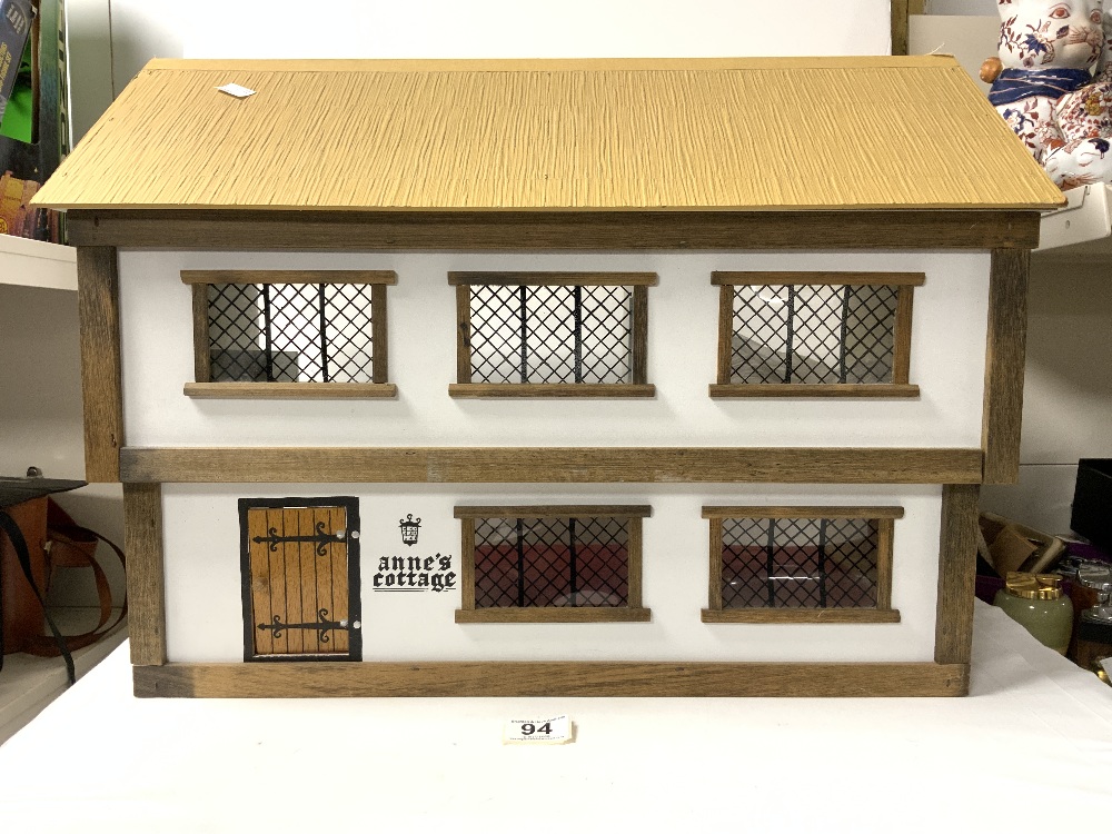 A PAINTED WOODEN DOLLS HOUSE - 60X45. - Image 2 of 5