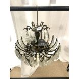 A METAL AND GLASS LOZENGE DROPS ELECTRIC CHANDELIER, 48 CMS DIAMETER.