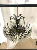 A METAL AND GLASS LOZENGE DROPS ELECTRIC CHANDELIER, 48 CMS DIAMETER.