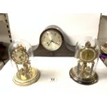 TWO GERMAN MADE CLOCKS UNDER GLASS DOMES; 23 CMS AND OAK ADMIRALS HAT MANTLE CLOCK.