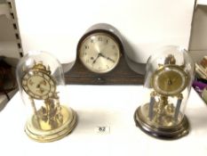 TWO GERMAN MADE CLOCKS UNDER GLASS DOMES; 23 CMS AND OAK ADMIRALS HAT MANTLE CLOCK.